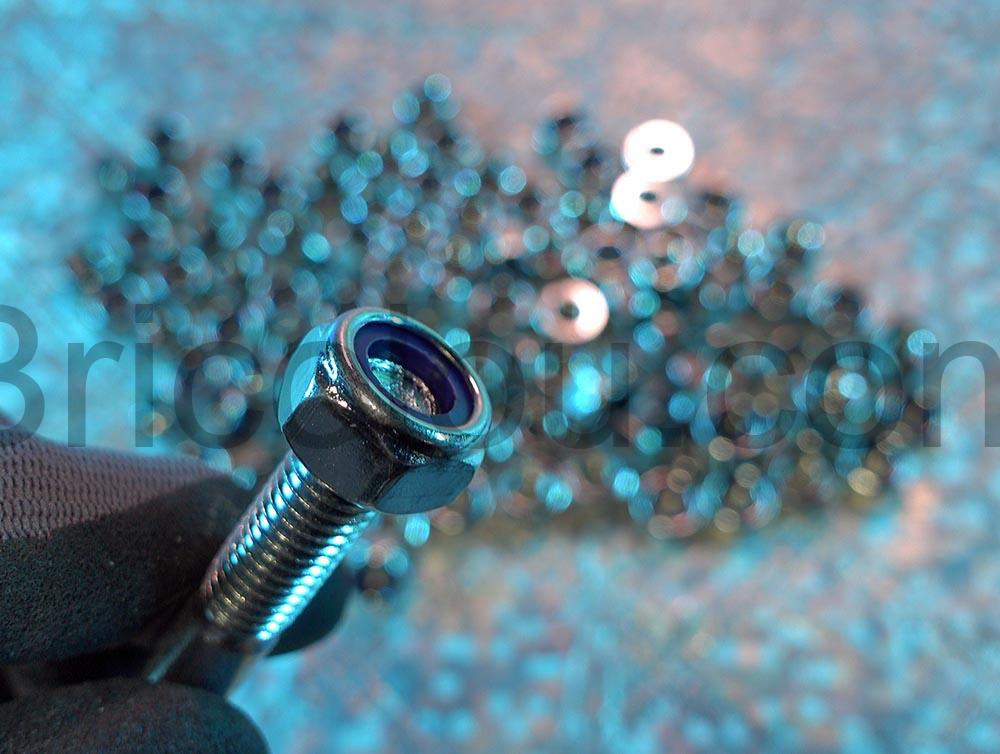 Boulon M10 Auto Freine DIN 985 Ecrou blocag cage Acier Rebadis serre Boulon M10 Auto-Freiné DIN 985 Écrou blocag cage Acier Rebadis serré