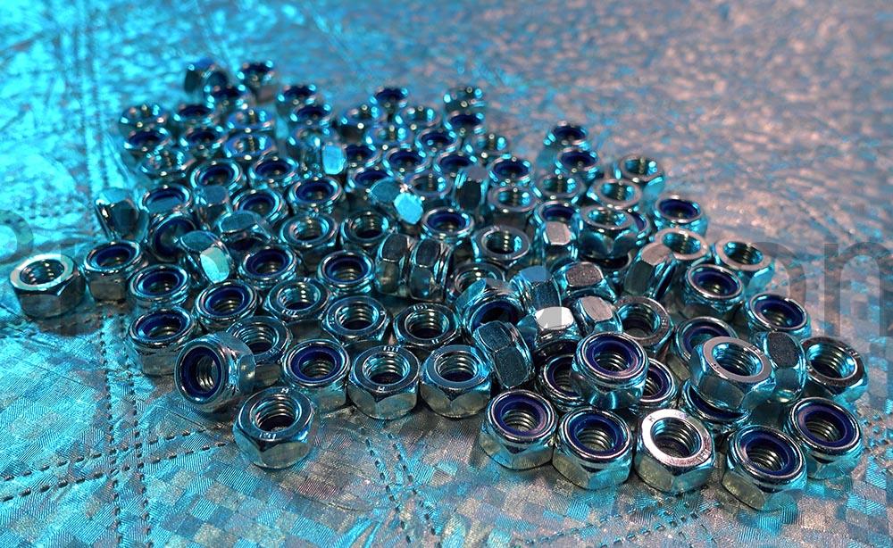 Boulon M10 Auto Freine DIN 985 Ecrou blocag cage Acier Rebadis vrac Boulon M10 Auto-Freiné DIN 985 Écrou blocag cage Acier Rebadis vrac